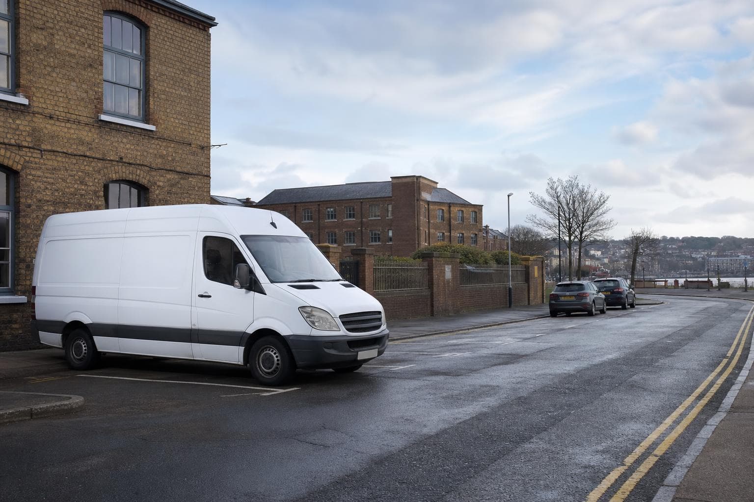 Unbranded courier vehicle ready to leave Plaistow with clinic packages, contractor tools and confidential papers secured for direct transport